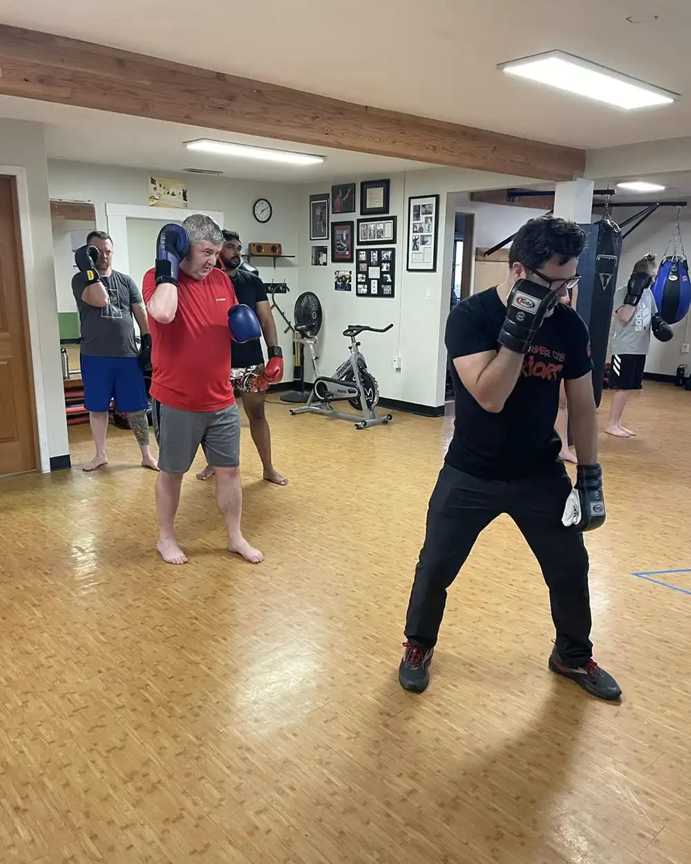 Coach Joe teaching proper stance in striking at River City Warriors